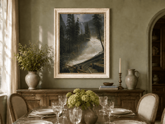 Framed hand-painted forest oil painting with figures beside a rushing river and waterfall displayed above a formal dining table.