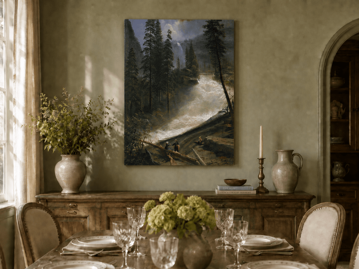 Unframed hand-painted forest oil painting with figures beside a rushing river and waterfall displayed above a formal dining table.