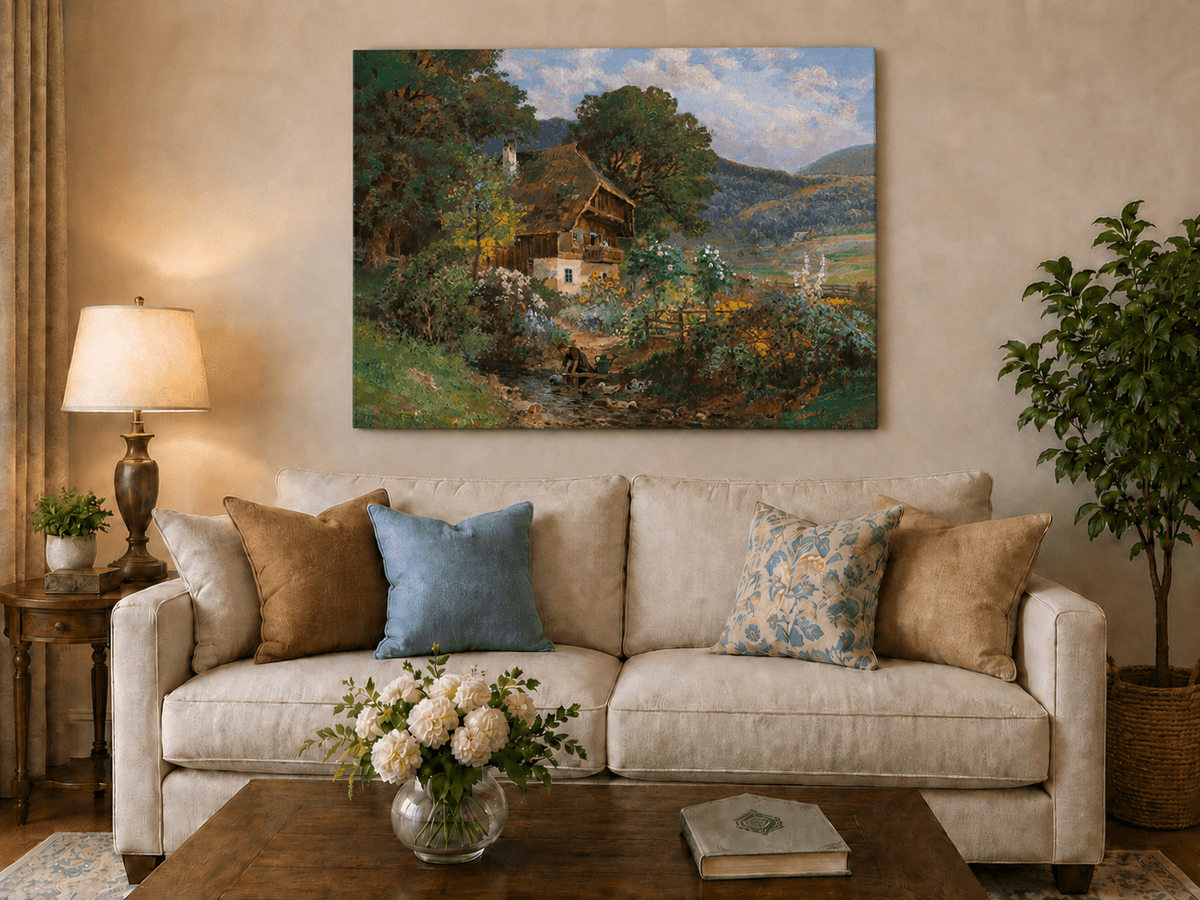 Unframed hand-painted rustic cottage oil painting in a colorful mountain valley displayed above a neutral living room sofa.