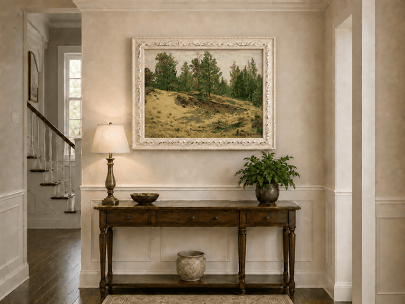 Framed hand-painted sandy forest clearing oil painting with scattered pines and open ground displayed above an entryway console table.