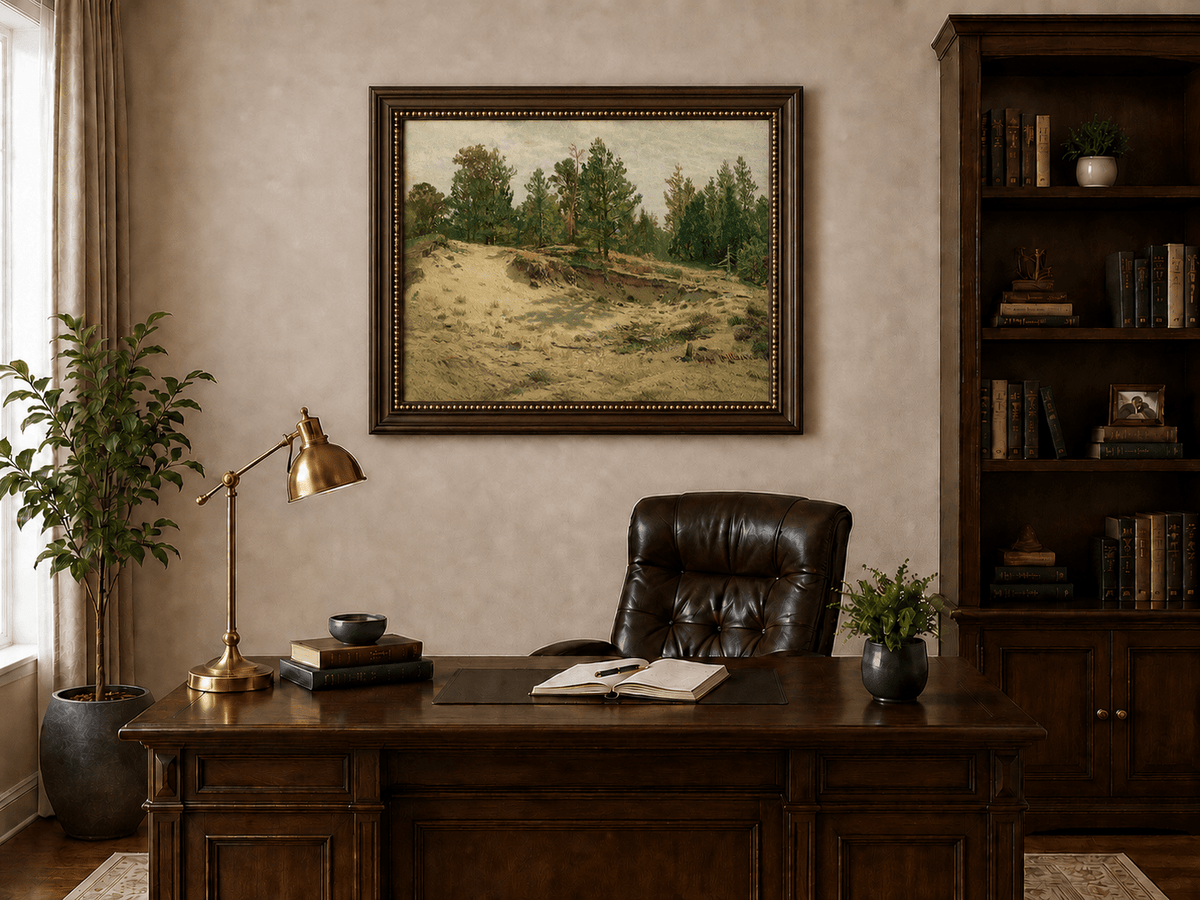 Framed hand-painted sandy forest clearing oil painting with scattered pines and open ground displayed above a traditional home office desk.