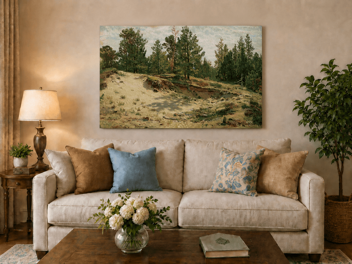 Unframed hand-painted sandy forest clearing oil painting with scattered pines and open ground displayed above a neutral living room sofa.