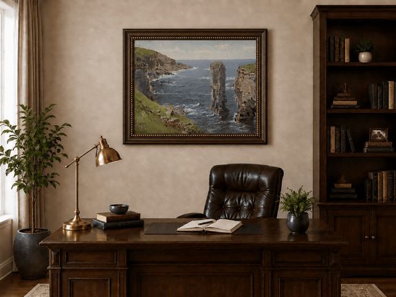 Framed hand-painted coastal oil painting with sea stacks, cliffs and churning ocean waves displayed above a traditional home office desk.