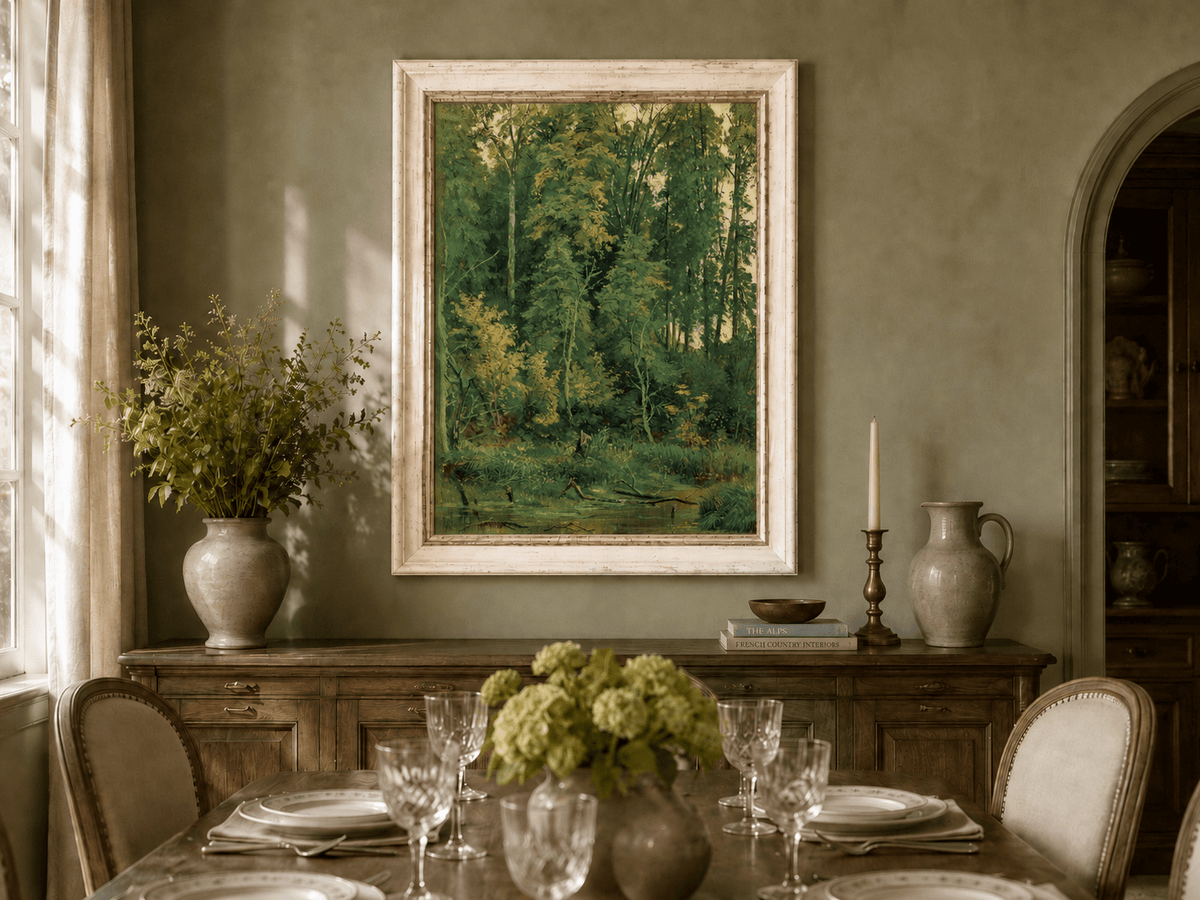 Framed hand-painted serene forest pond oil painting with leafy trees and still water displayed above a formal dining table.
