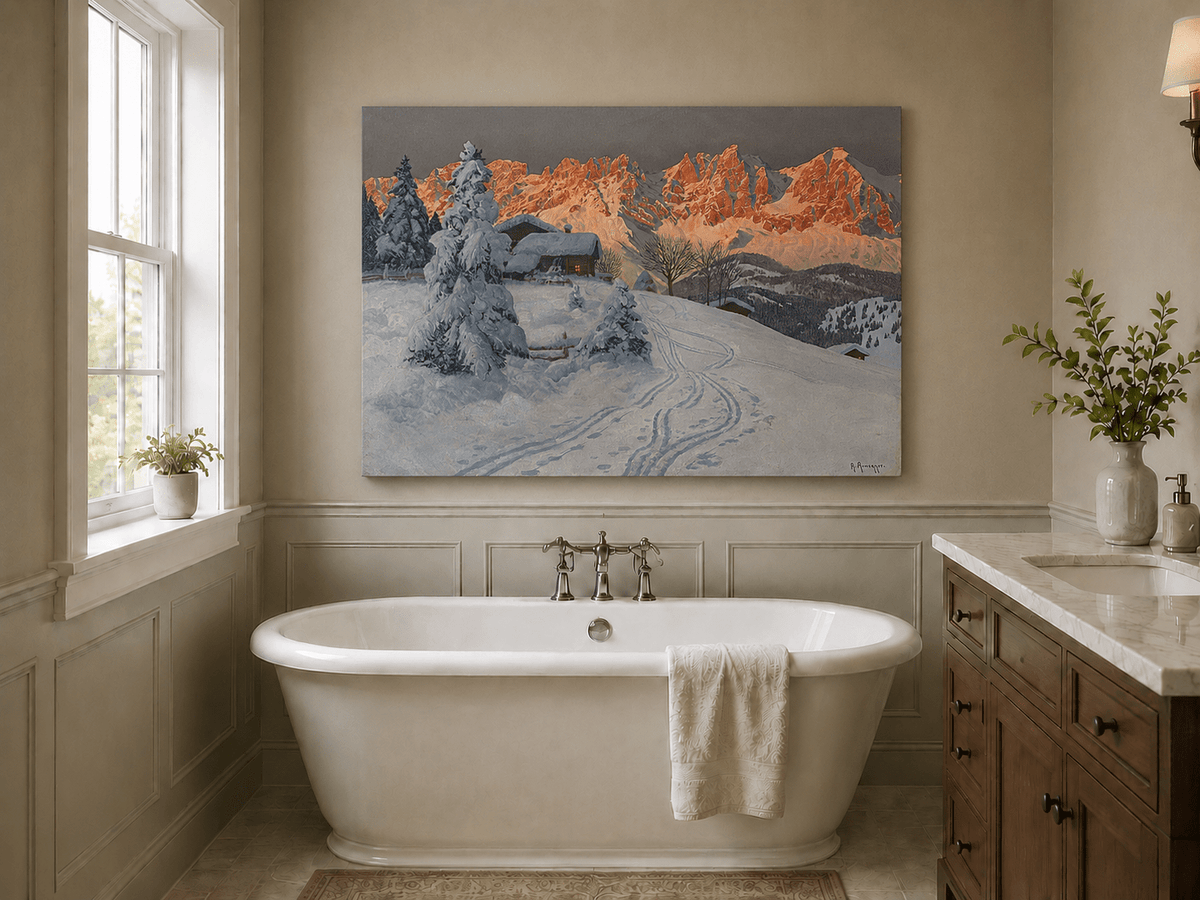 Unframed hand-painted winter alpine oil painting with a snowy cabin and mountains at sunset displayed above a freestanding bathtub.
