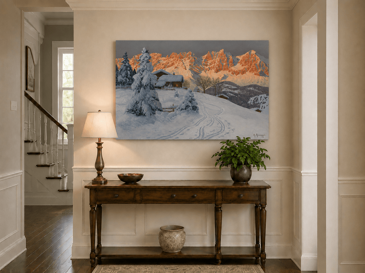 Unframed hand-painted winter alpine oil painting with a snowy cabin and mountains at sunset displayed above an entryway console table.