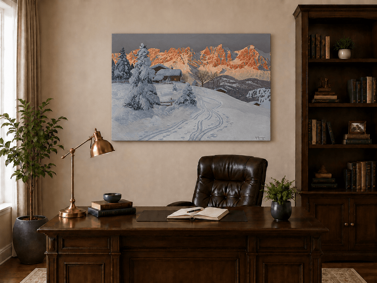 Unframed hand-painted winter alpine oil painting with a snowy cabin and mountains at sunset displayed above a traditional home office desk.