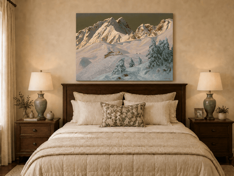 Unframed hand-painted alpine oil painting with snowy mountain peaks glowing at dawn displayed above a wooden bed in a neutral bedroom.
