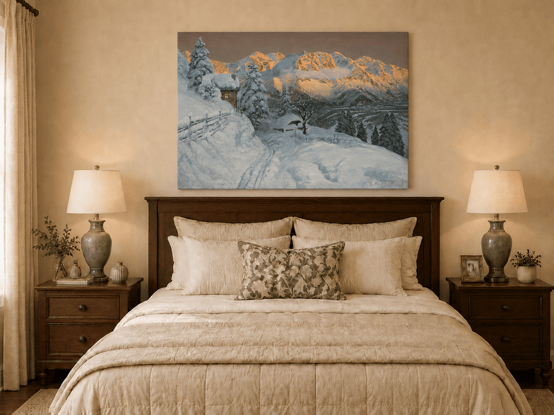 Unframed hand-painted winter mountain oil painting with a snowy hut and tracks displayed above a wooden bed in a neutral bedroom.