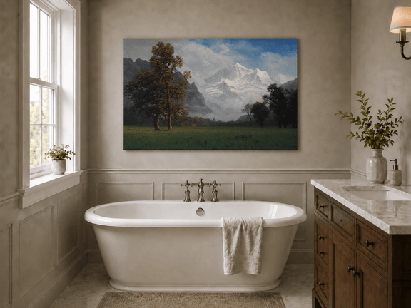 Unframed hand-painted snowy mountain valley oil painting with a meadow and tall trees displayed above a freestanding bathtub.