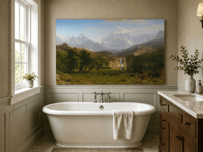 Unframed hand-painted mountain landscape oil painting with snowy peaks, a lake and teepee camp displayed above a freestanding bathtub.