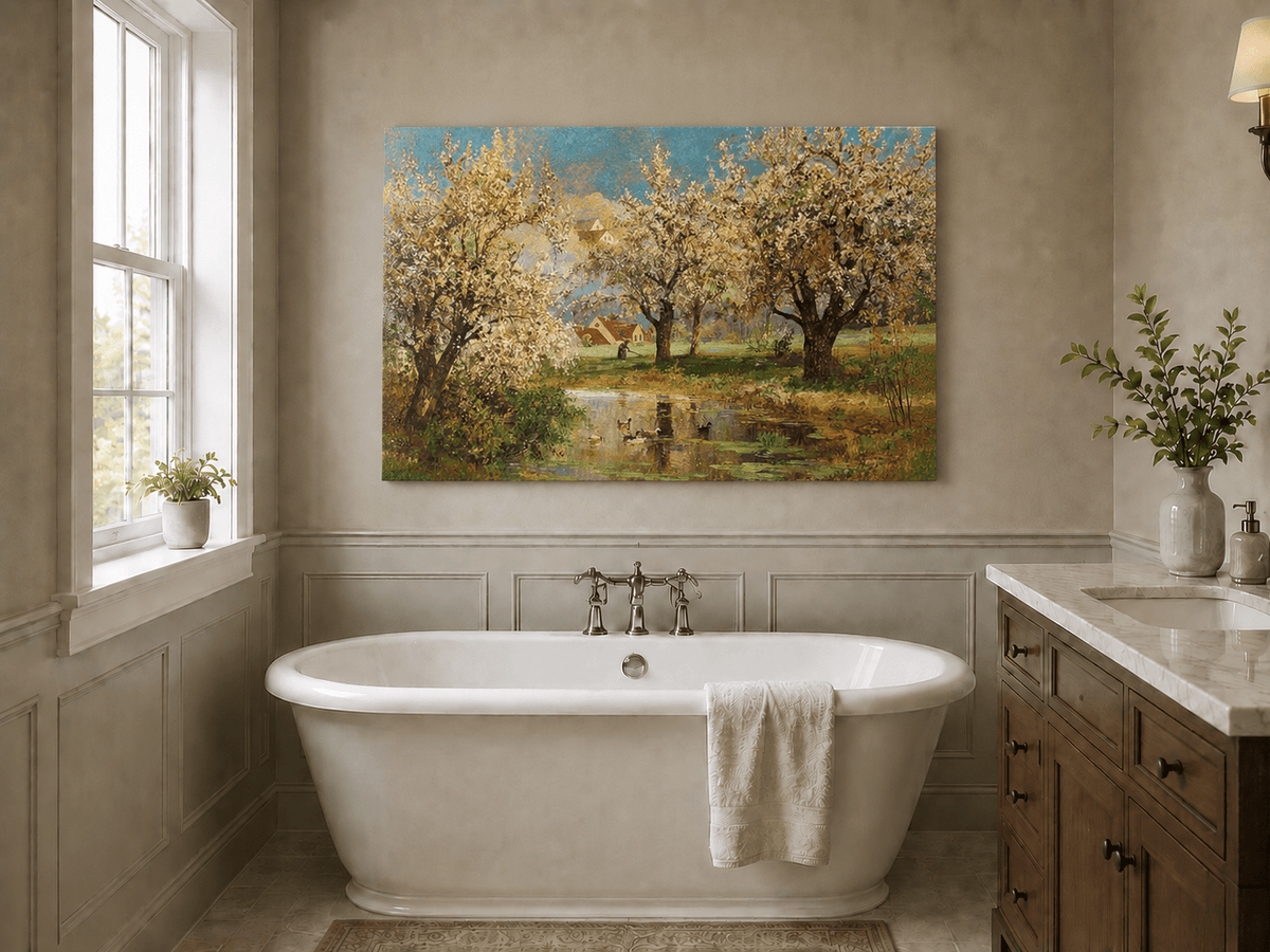 Unframed hand-painted spring orchard oil painting with blossoming trees around a quiet pond displayed above a freestanding bathtub.