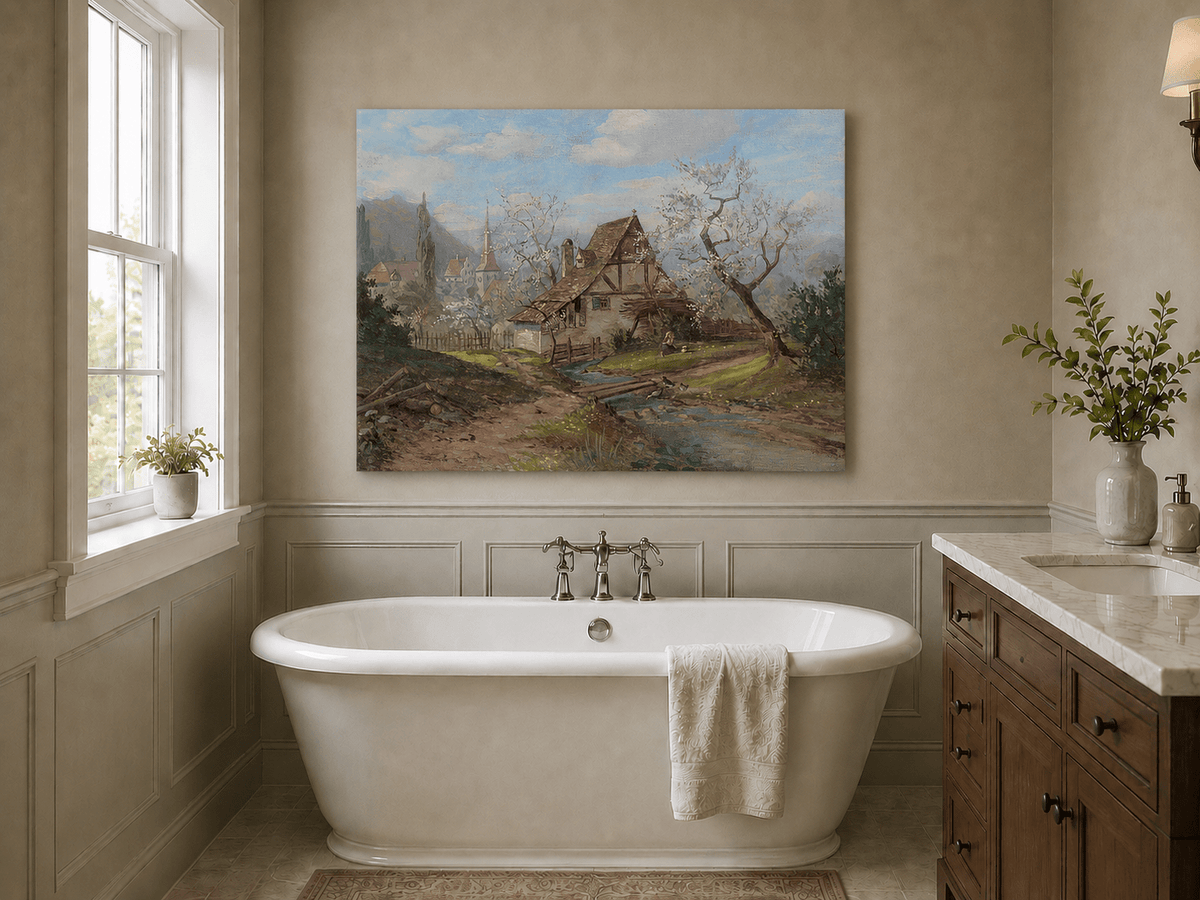 Unframed hand-painted spring cottage oil painting beside a stream and blossoming trees displayed above a freestanding bathtub.