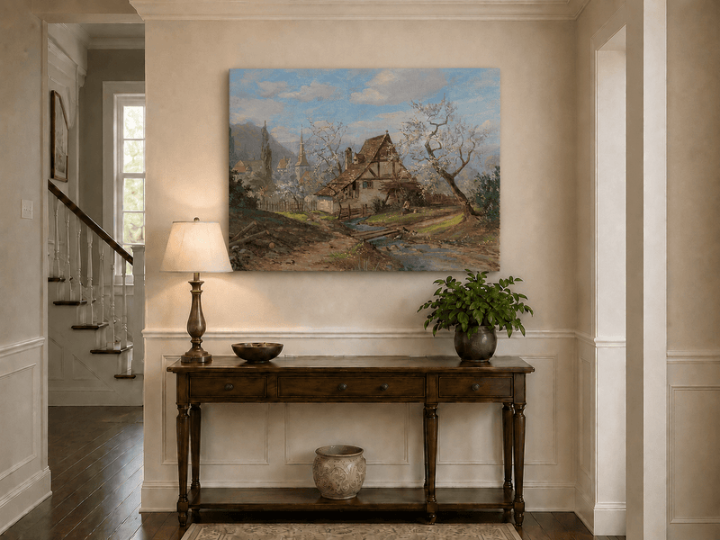 Unframed hand-painted spring cottage oil painting beside a stream and blossoming trees displayed above an entryway console table.
