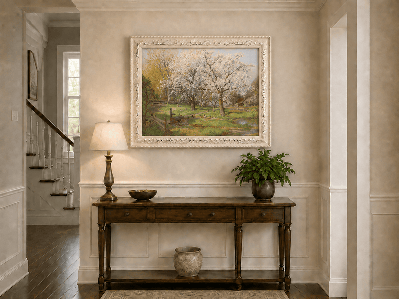 Framed hand-painted spring farm oil painting with flowering trees and poultry displayed above an entryway console table.