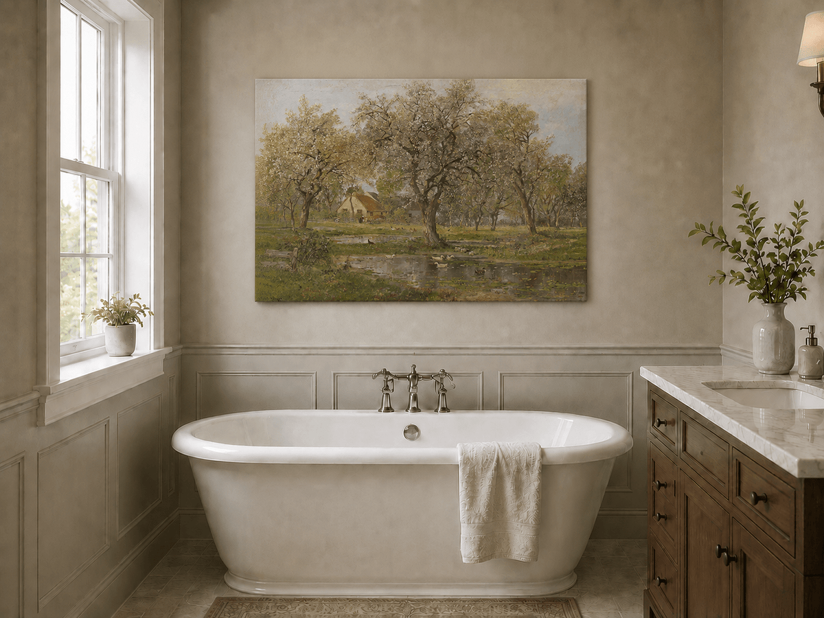 Unframed hand-painted spring orchard oil painting with blossoming trees, a farmhouse and pond displayed above a freestanding bathtub.