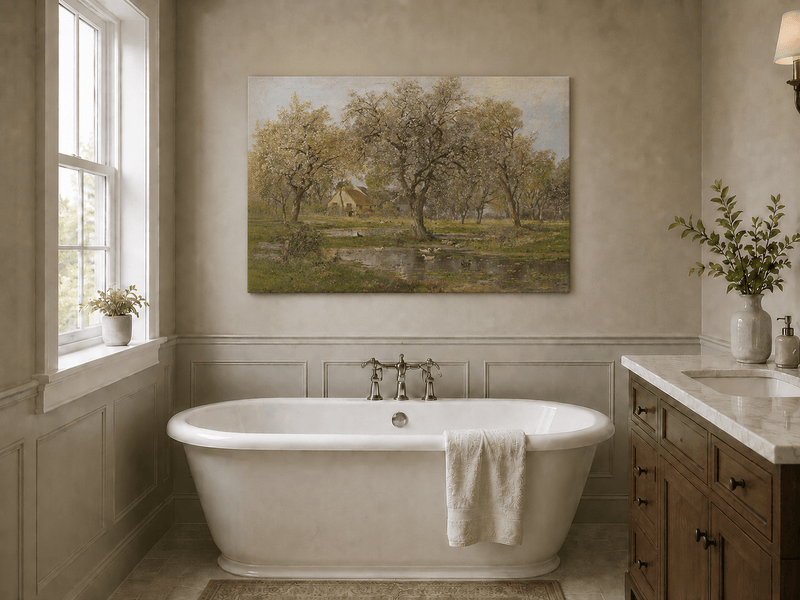 Unframed hand-painted spring orchard oil painting with blossoming trees, a farmhouse and pond displayed above a freestanding bathtub.