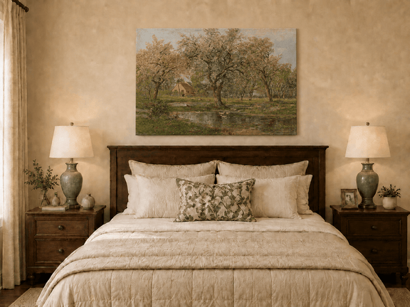 Unframed hand-painted spring orchard oil painting with blossoming trees, a farmhouse and pond displayed above a wooden bed in a neutral bedroom.