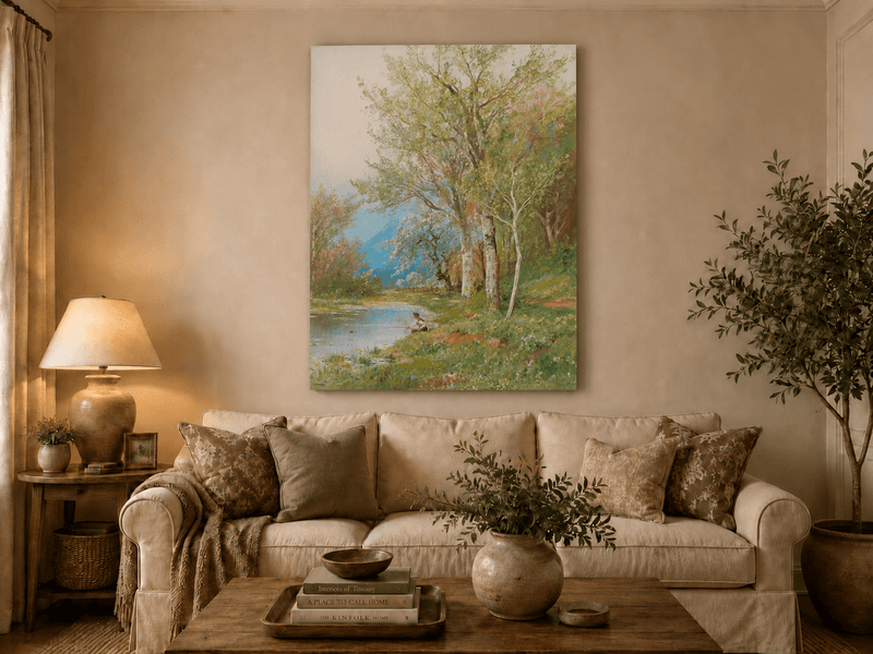 Unframed hand-painted spring river oil painting with a fisherman beneath leafy trees displayed above a neutral living room sofa.
