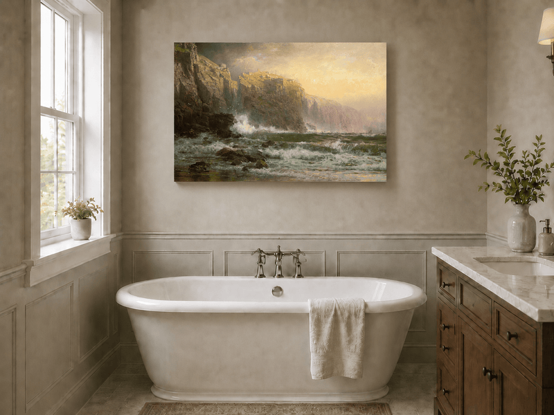 Unframed hand-painted stormy seascape oil painting with a reef, surf and golden coastal cliffs displayed above a freestanding bathtub.