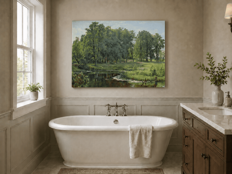 Unframed hand-painted summer forest oil painting with a river, path and lush green trees displayed above a freestanding bathtub.