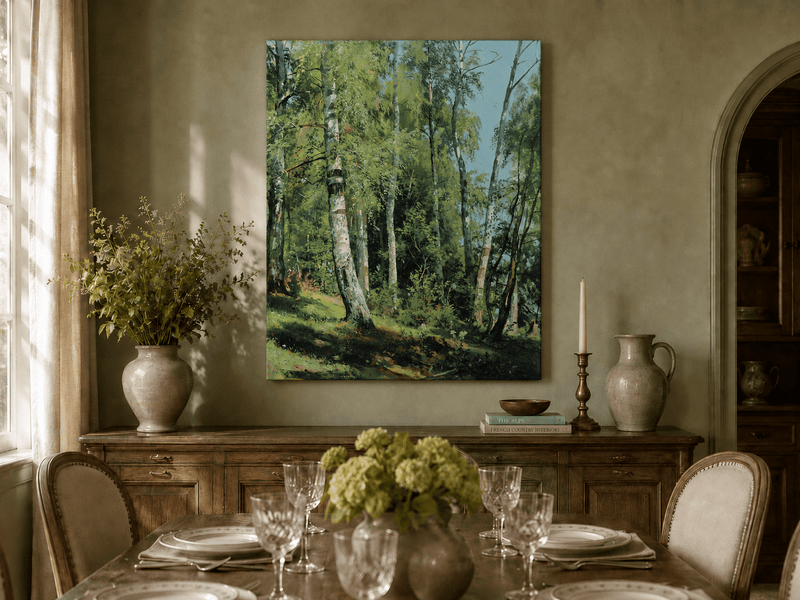 Unframed hand-painted sunlit birch forest oil painting with a bright woodland clearing displayed above a formal dining table.