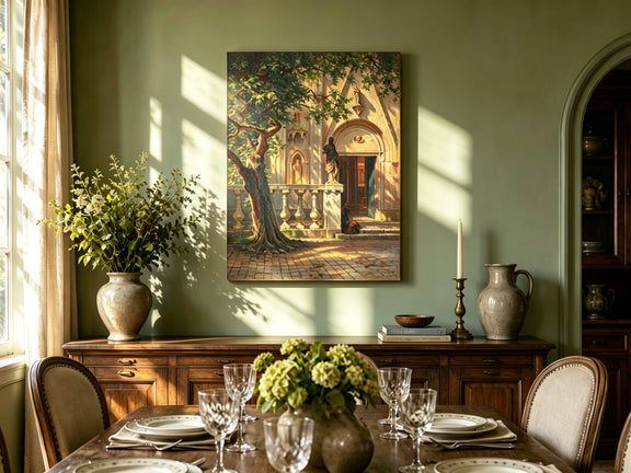 Unframed hand-painted church courtyard oil painting with an old tree in warm sunlight displayed above a formal dining table.