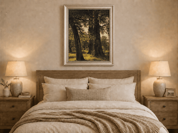 Framed hand-painted sunlit forest oil painting with massive ancient trees and golden ground displayed above a wooden bed in a neutral bedroom.