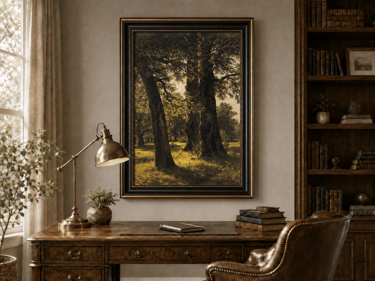 Framed hand-painted sunlit forest oil painting with massive ancient trees and golden ground displayed above a traditional home office desk.
