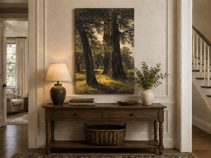 Unframed hand-painted sunlit forest oil painting with massive ancient trees and golden ground displayed above an entryway console table.