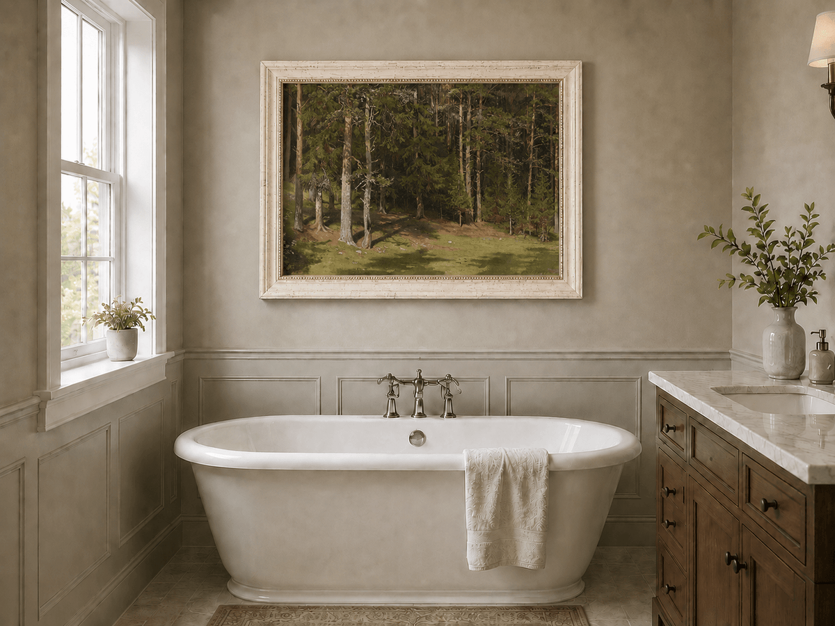 Framed hand-painted sunlit forest glade oil painting with a peaceful woodland clearing displayed above a freestanding bathtub.