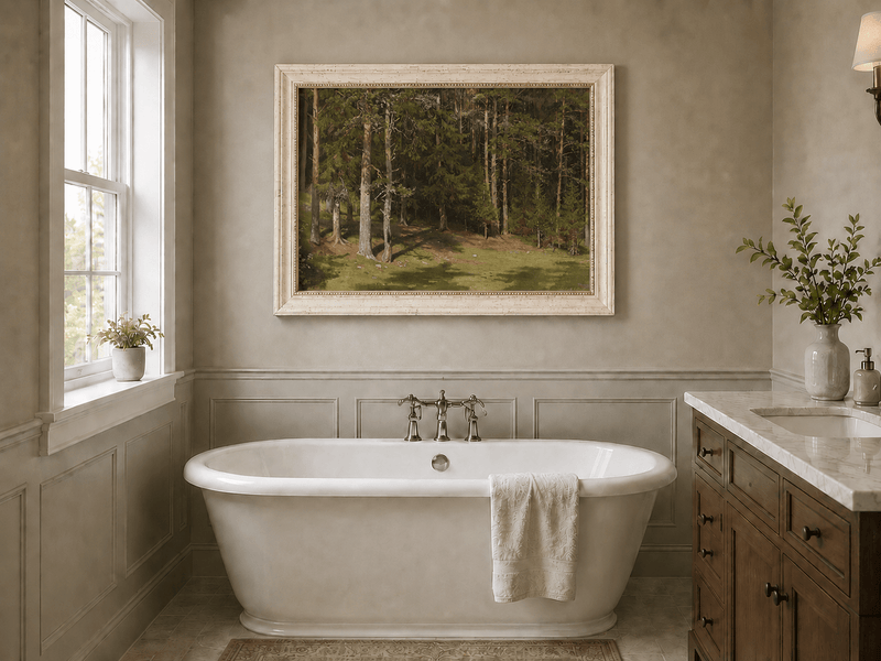 Framed hand-painted sunlit forest glade oil painting with a peaceful woodland clearing displayed above a freestanding bathtub.