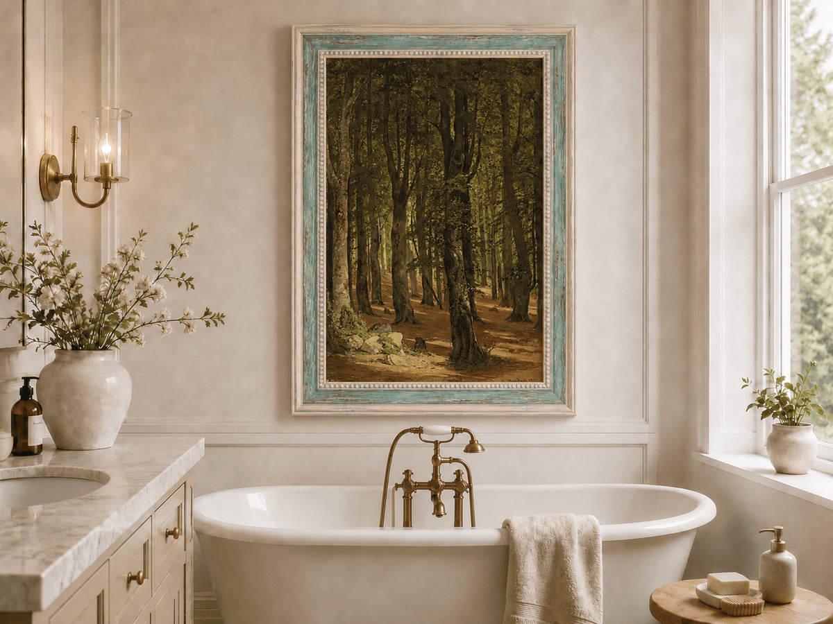 Framed hand-painted sunlit forest interior oil painting with a warm path beneath tall trees displayed above a freestanding bathtub.