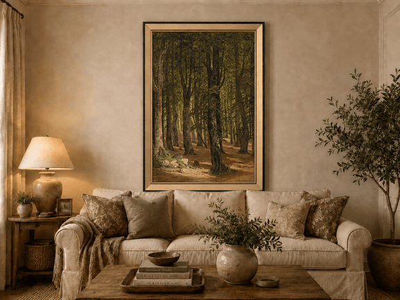 Framed hand-painted sunlit forest interior oil painting with a warm path beneath tall trees displayed above a neutral living room sofa.