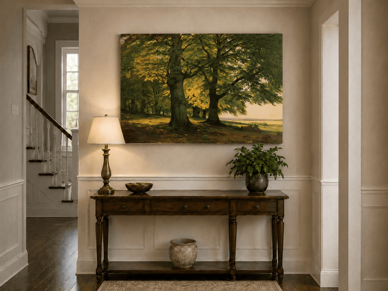 Unframed hand-painted sunlit forest oil painting with two large spreading trees displayed above an entryway console table.