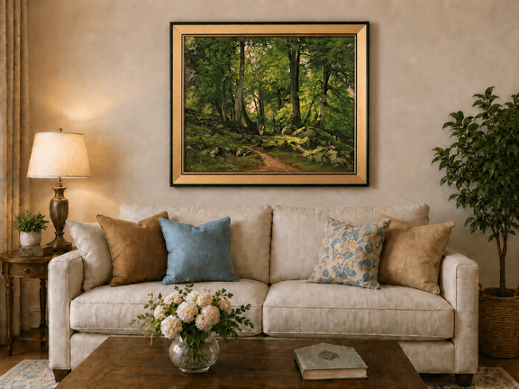 Framed hand-painted sunlit forest path oil painting with a solitary figure among green trees displayed above a neutral living room sofa.