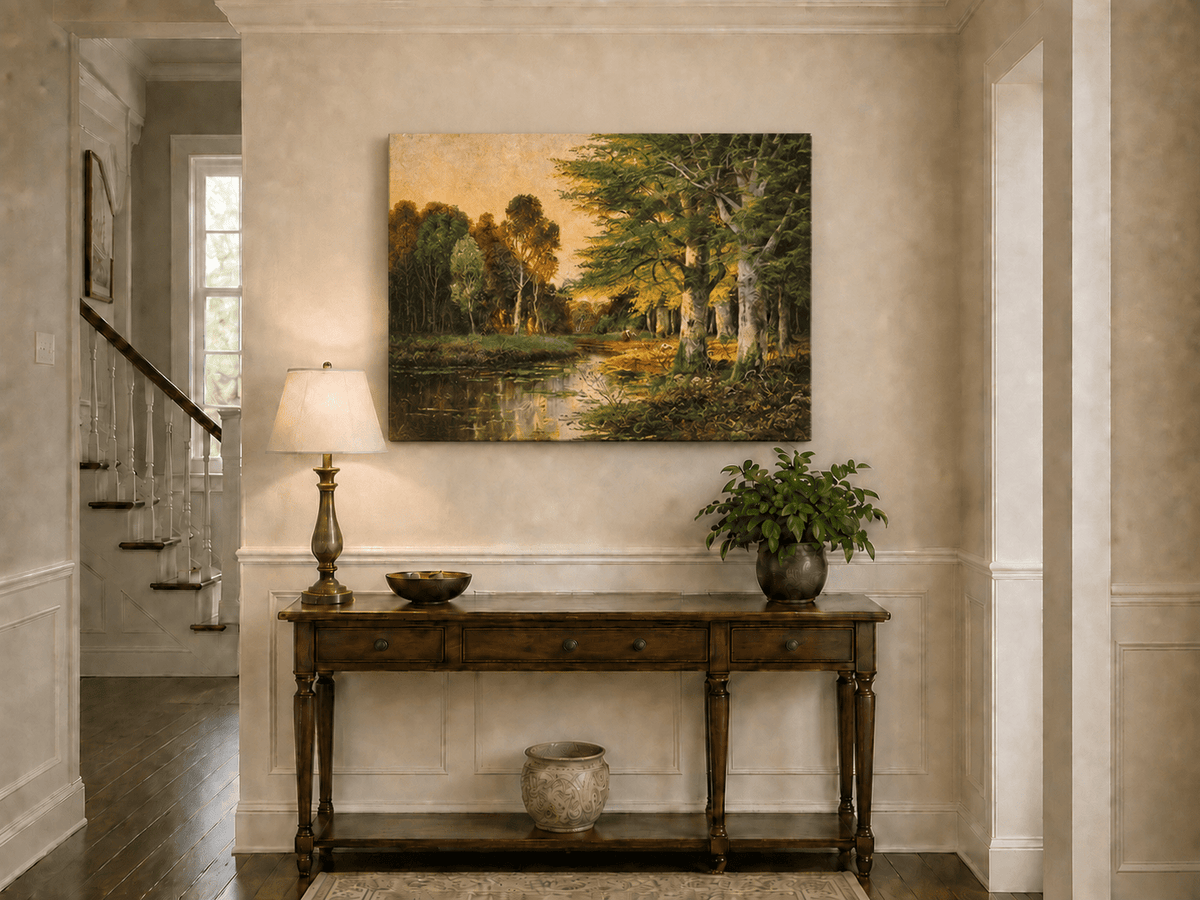 Unframed hand-painted riverside grove oil painting with sunlit trees reflected at sunset displayed above an entryway console table.