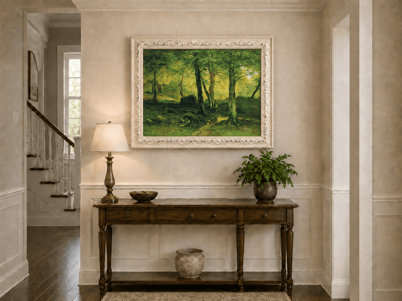 Framed hand-painted sunlit woodland path oil painting with figures beneath leafy trees displayed above an entryway console table.