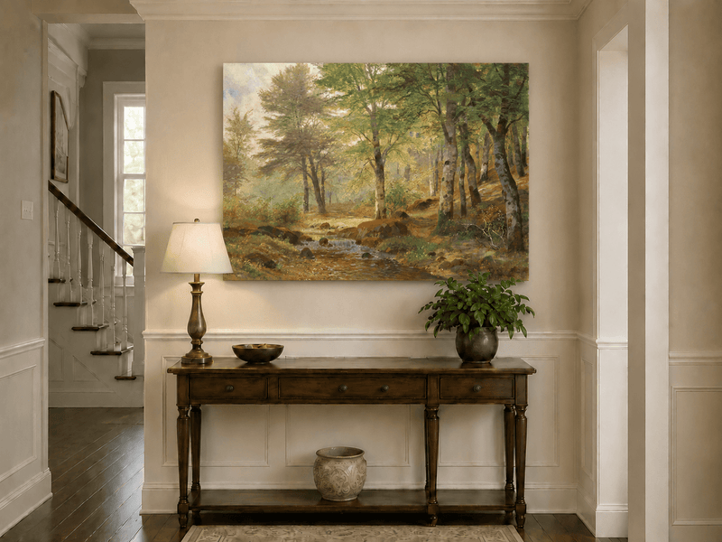 Unframed hand-painted sunlit woodland stream oil painting with slender birch trees displayed above an entryway console table.