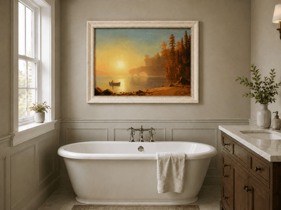 Framed hand-painted sunset lake oil painting with a canoe on glowing water displayed above a freestanding bathtub.