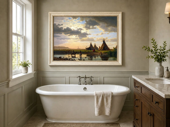 Framed hand-painted sunset river camp oil painting with tipis and riders crossing the water displayed above a freestanding bathtub.