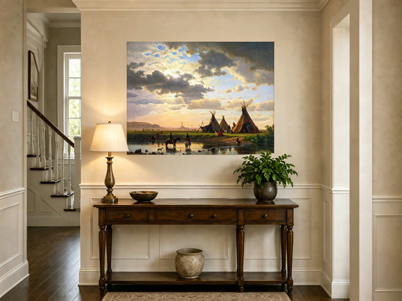 Unframed hand-painted sunset river camp oil painting with tipis and riders crossing the water displayed above an entryway console table.
