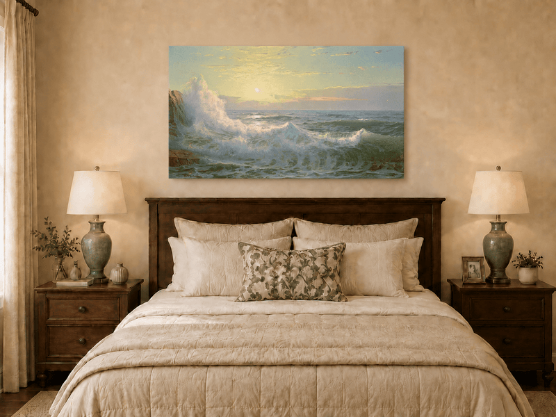 Unframed hand-painted sunset seascape oil painting with luminous crashing waves displayed above a wooden bed in a neutral bedroom.