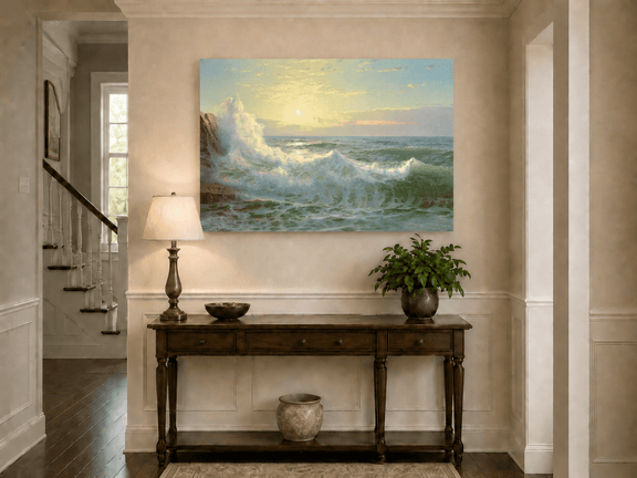 Unframed hand-painted sunset seascape oil painting with luminous crashing waves displayed above an entryway console table.