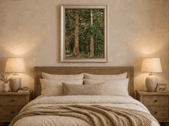Framed hand-painted tall pine forest oil painting with lush green undergrowth displayed above a wooden bed in a neutral bedroom.