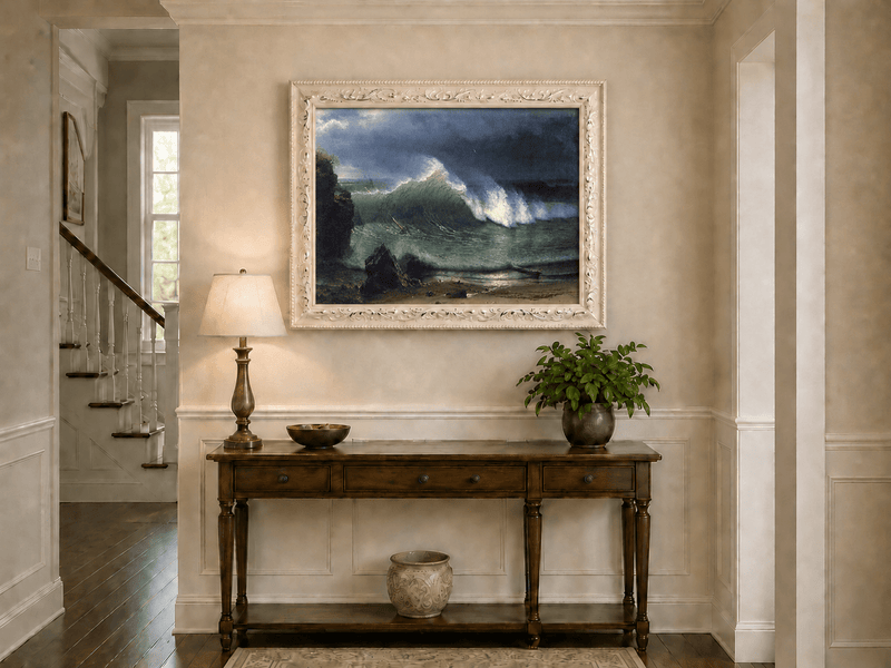 Framed hand-painted stormy seascape oil painting with a towering ocean wave displayed above an entryway console table.