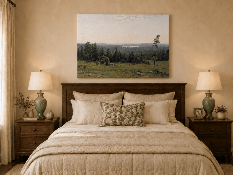Unframed hand-painted panoramic oil painting with a vast forest, meadow and distant lake displayed above a wooden bed in a neutral bedroom.
