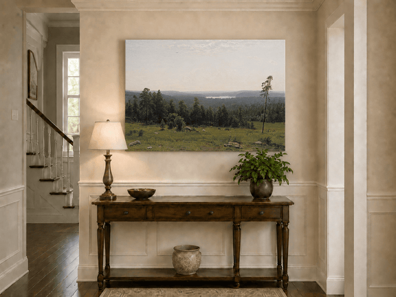 Unframed hand-painted panoramic oil painting with a vast forest, meadow and distant lake displayed above an entryway console table.