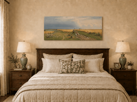 Unframed hand-painted wheat field oil painting with a winding path beneath a dramatic sky displayed above a wooden bed in a neutral bedroom.