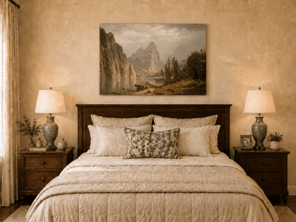 Unframed hand-painted Yosemite Valley oil painting with the Merced River and mountain cliffs displayed above a wooden bed in a neutral bedroom.